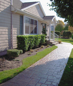 New House Built with Stamped Concrete Walkway